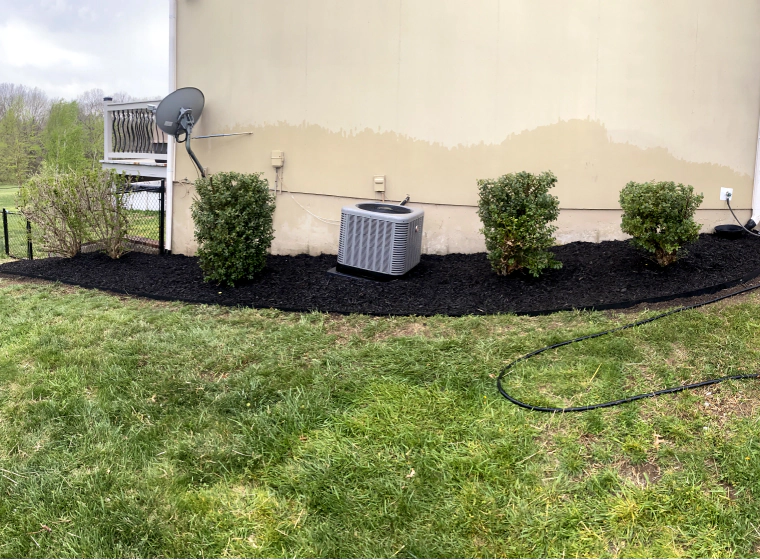 newly installed landscape beside house